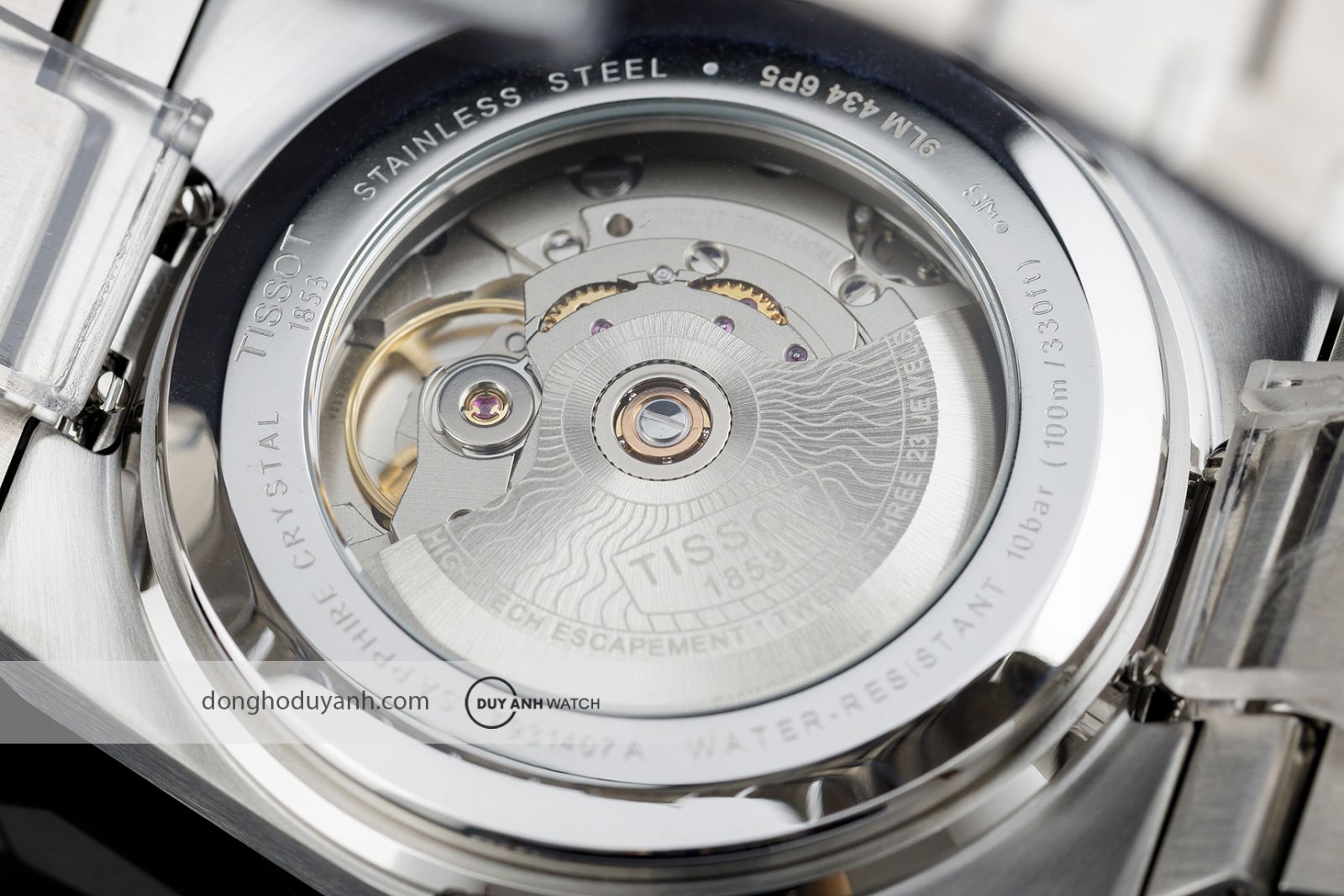 Mặt đáy Tissot PRX Powermatic 80 Steel 18K Gold T931.407.41.031.01